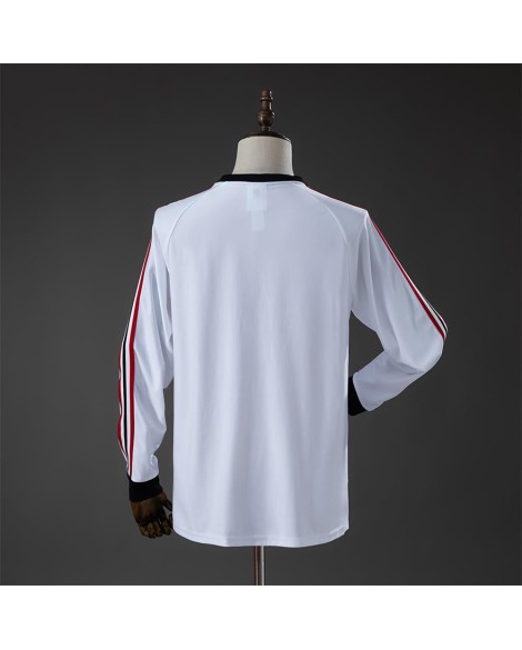 T-shirt blanc manches longues icône tribune MU
